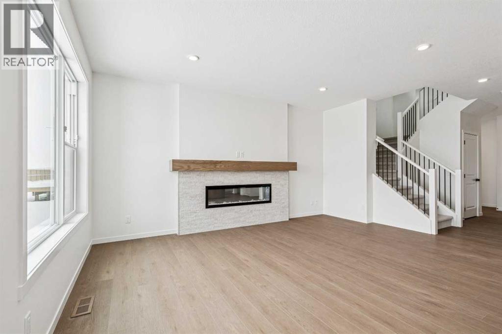 208 Southborough Common, Cochrane, Alberta  T4C 3J5 - Photo 5 - A2290815