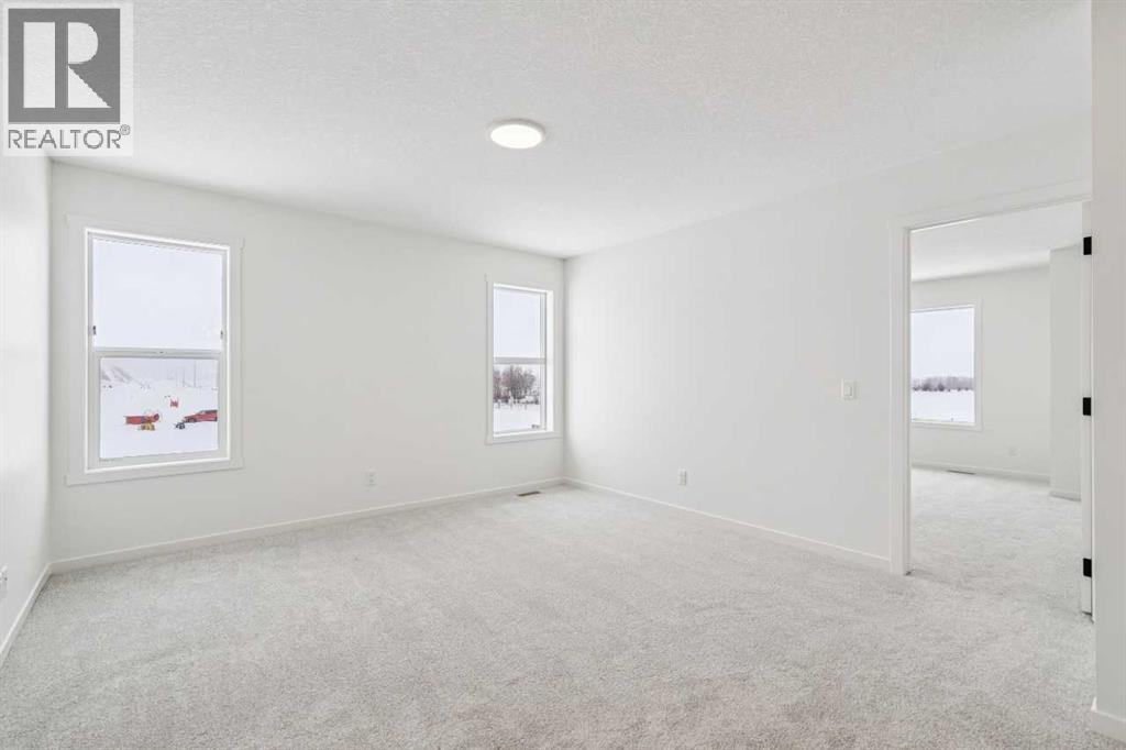 208 Southborough Common, Cochrane, Alberta  T4C 3J5 - Photo 20 - A2290815