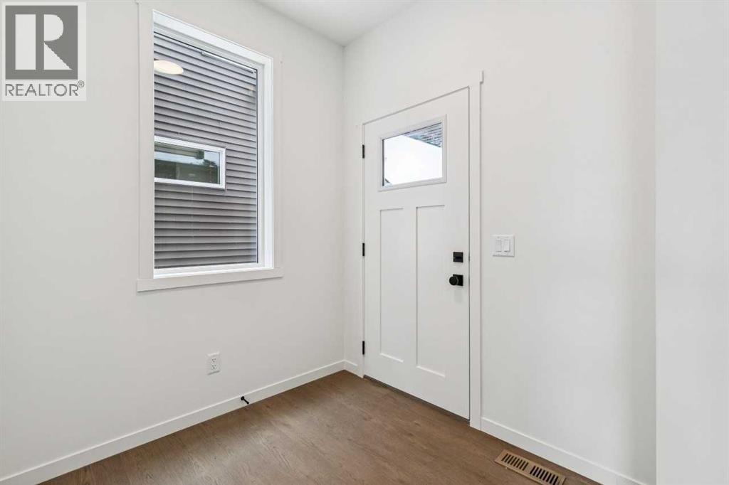 208 Southborough Common, Cochrane, Alberta  T4C 3J5 - Photo 3 - A2290815