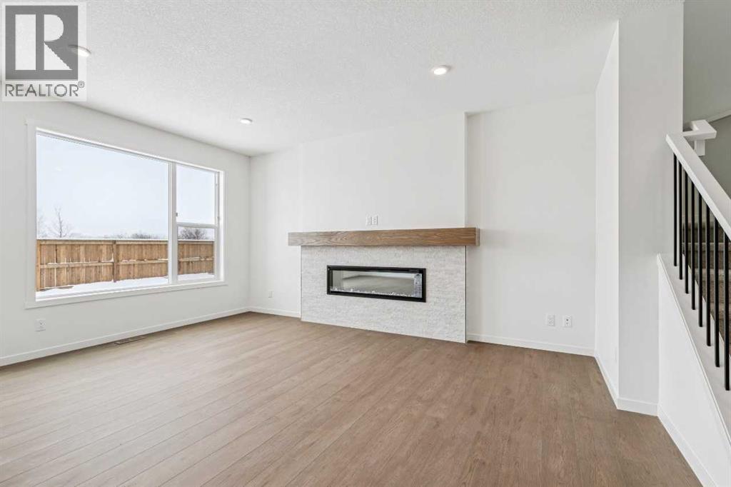 208 Southborough Common, Cochrane, Alberta  T4C 3J5 - Photo 4 - A2290815