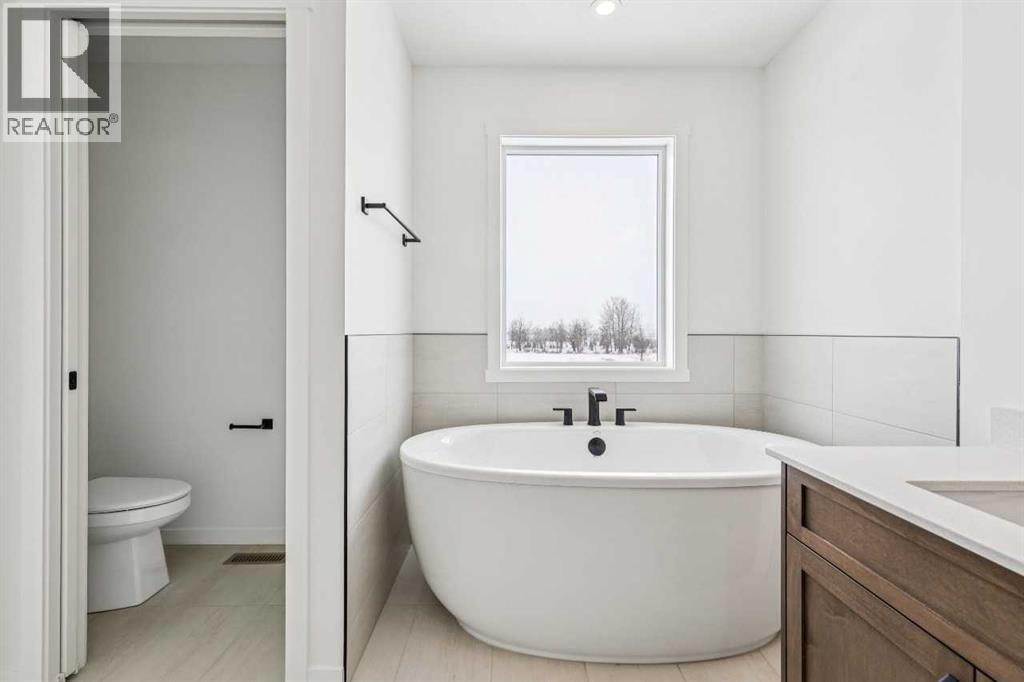 208 Southborough Common, Cochrane, Alberta  T4C 3J5 - Photo 28 - A2290815