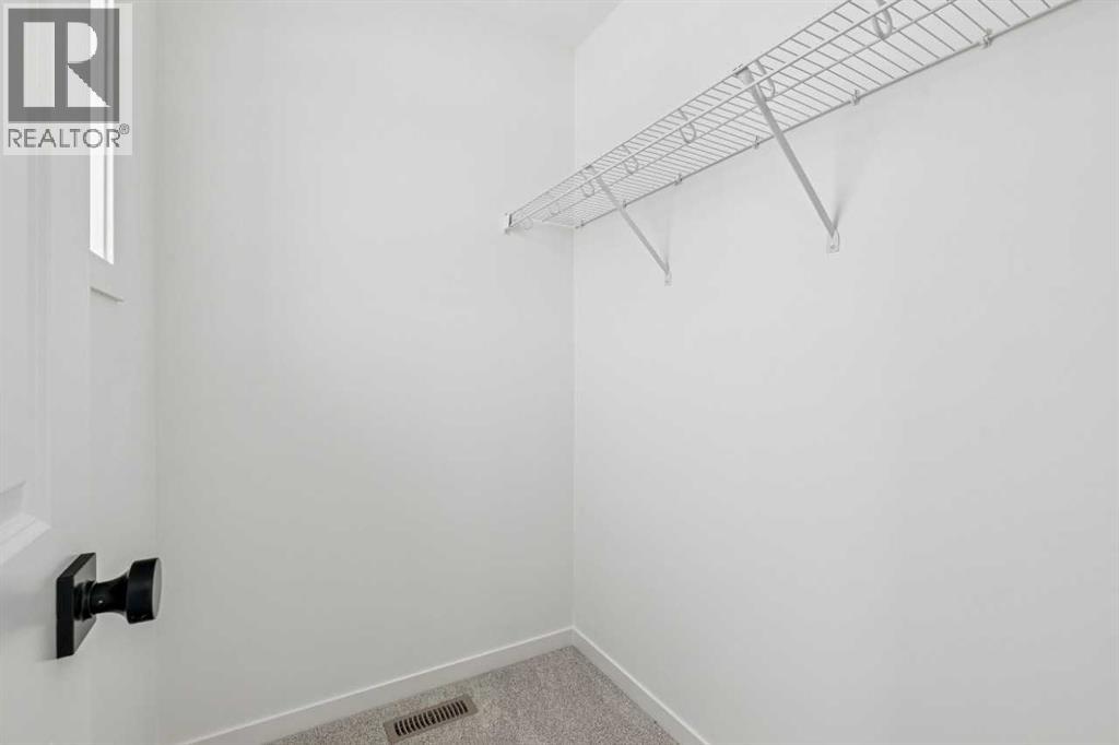 208 Southborough Common, Cochrane, Alberta  T4C 3J5 - Photo 33 - A2290815