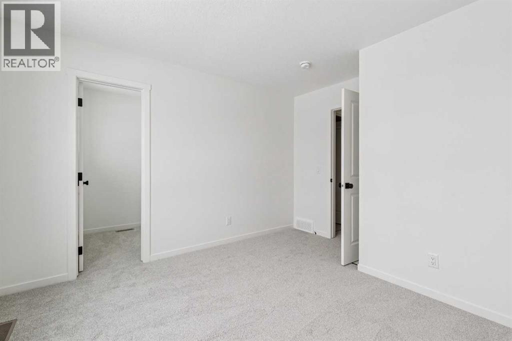 208 Southborough Common, Cochrane, Alberta  T4C 3J5 - Photo 32 - A2290815