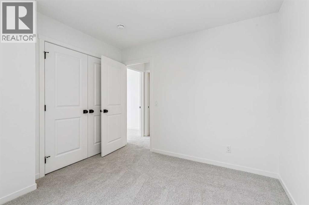 208 Southborough Common, Cochrane, Alberta  T4C 3J5 - Photo 35 - A2290815