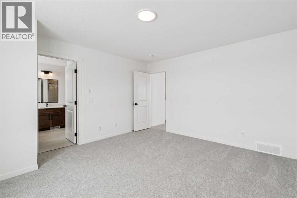 208 Southborough Common, Cochrane, Alberta  T4C 3J5 - Photo 24 - A2290815