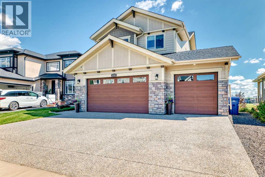 239 Stonemere Green, Chestermere, Alberta  T1X 0S1 - Photo 2 - A2280894