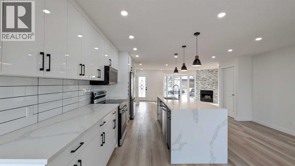 4 Harvey Place Sw, Calgary, Alberta  T2V 3A5 - Photo 8 - A2289807