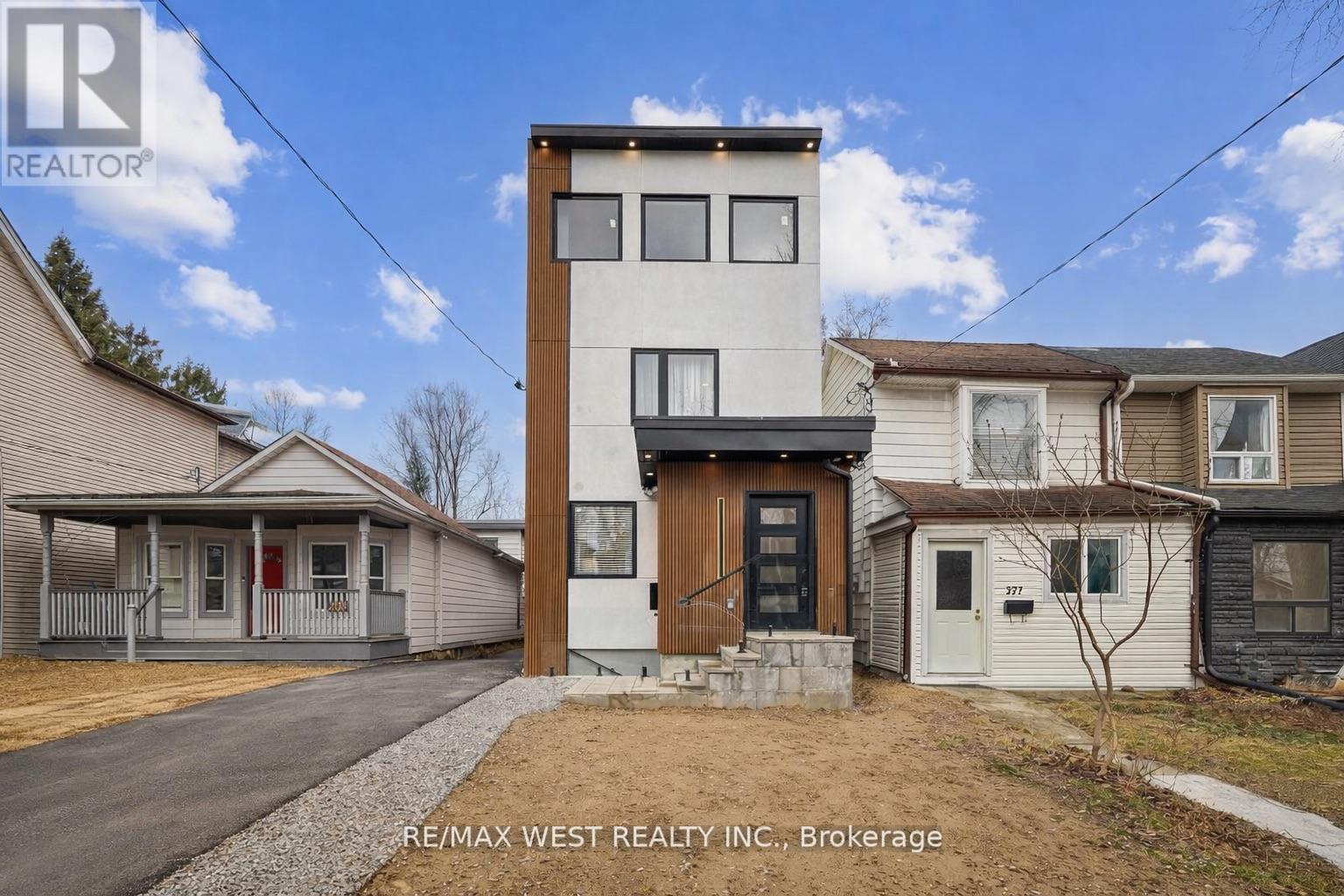 201 Rhodes Avenue, Toronto, Ontario  M4L 3A2 - Photo 3 - E12979642
