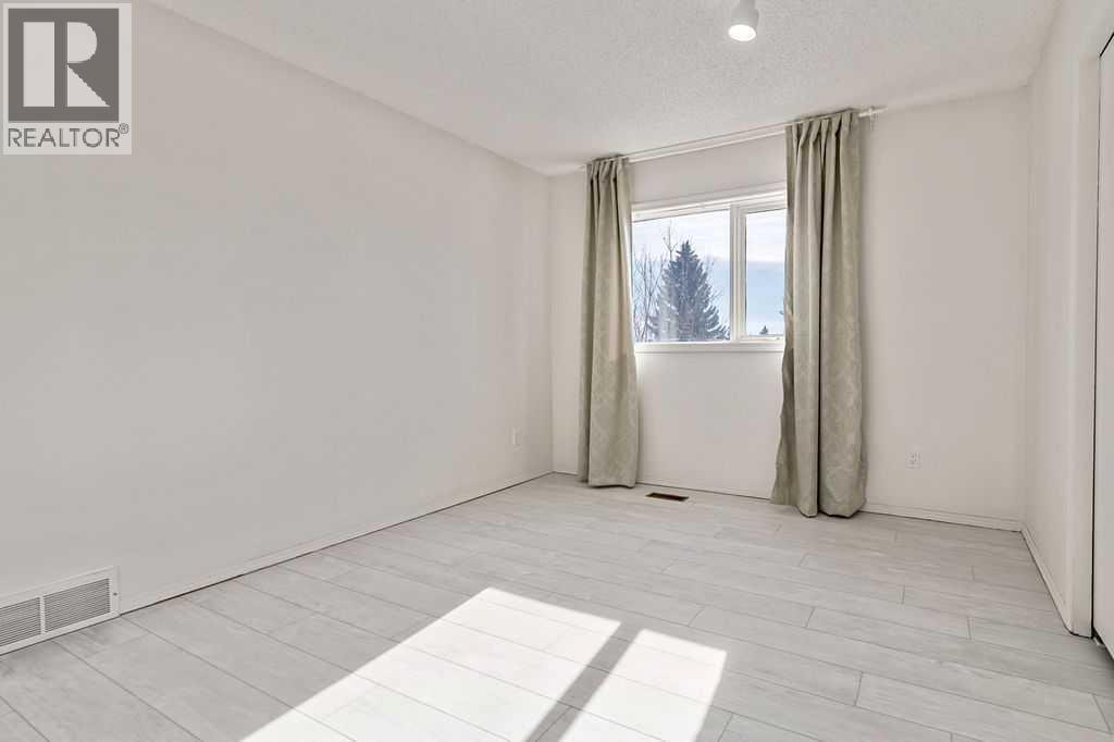 162 Woodbend Way, Okotoks, Alberta  T1S 1M1 - Photo 35 - A2287796