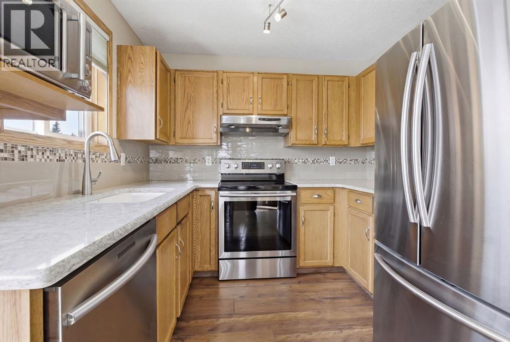 9 Harvest Glen Way NE, Calgary, Alberta  T3K 4J2 - Photo 13 - A2299926