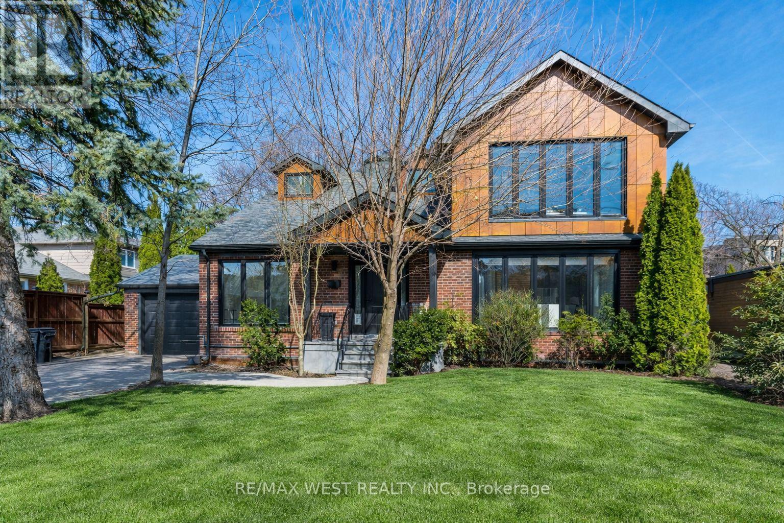 Custom 4+1 Bed, 5 Bath Home On Premium 62 x 132 Ft Lot Offering Approx. 3,200 Sq Ft Of Finished Living Space. Featuring A Designer Chef's Custom Kitchen With Waterfall Centre Island, Extensive Cabinetry & JennAir Stainless Steel Appliances. Open Concept Living & Dining Area With Gas Fireplace. New Hardwood Flooring Throughout. Well-Built, Well-Insulated Home With Quality Finishes & A Thoughtfully Designed, Unique Layout. Upper Hallway Showcases A Dome-Shaped Skylight Bringing In Abundant Natural Light. Primary Bedroom Retreat Features Vaulted Ceiling With Wood Framing, Walk-In Closet & Spa-Like Ensuite. Excellent Location With Easy Access To Hwy 427, QEW & 401, Close To Parks, Schools & Amenities. (id:48254)