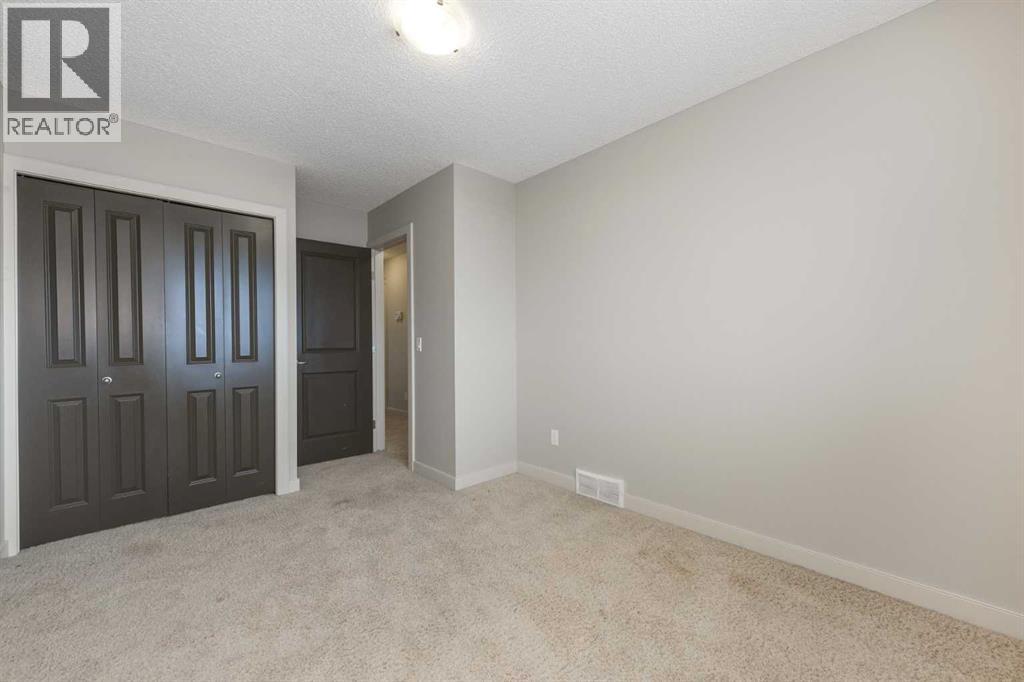 124 Evanscove Manor NW, Calgary, Alberta  T3P 0E5 - Photo 23 - A2298744