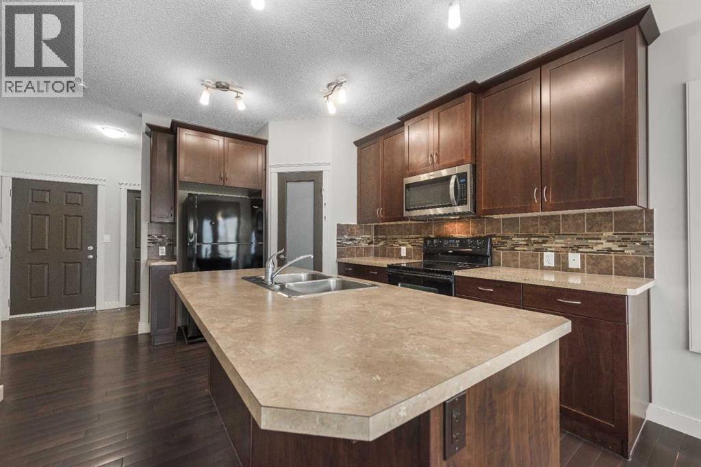 124 Evanscove Manor NW, Calgary, Alberta  T3P 0E5 - Photo 3 - A2298744