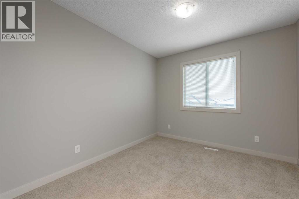 124 Evanscove Manor NW, Calgary, Alberta  T3P 0E5 - Photo 24 - A2298744