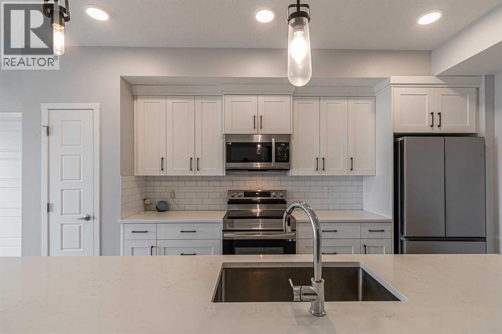 203, 360 Harvest Hills Way NE, Calgary, Alberta  T3K 2S1 - Photo 2 - A2300534