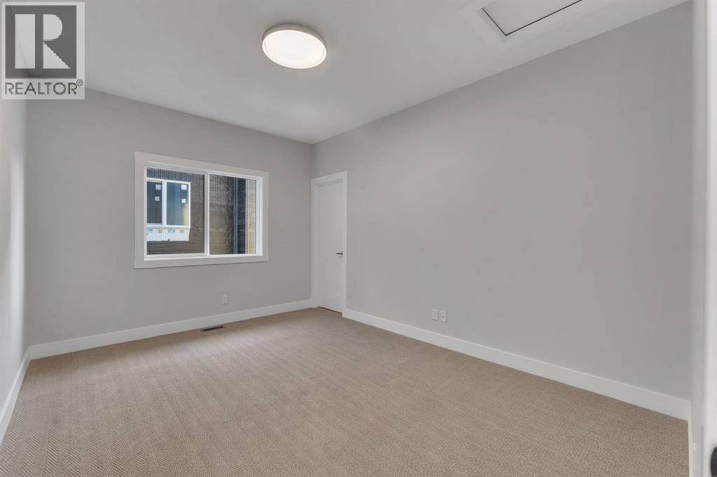 28 Spring Creek Point Sw, Calgary, Alberta  T3H 6E2 - Photo 32 - A2287176