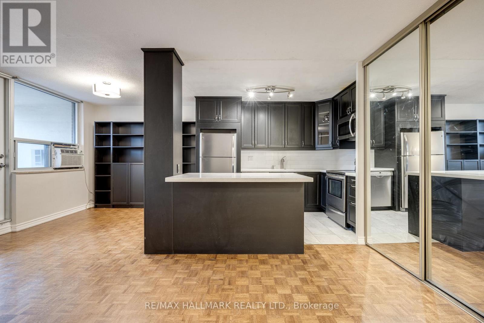 1715 - 40 Homewood Avenue, Toronto, Ontario  M4Y 2K2 - Photo 3 - C12980284