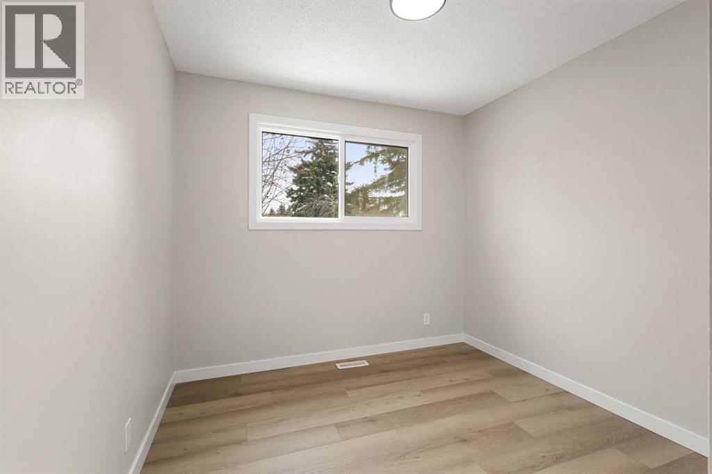 347 Queensland Drive Se, Calgary, Alberta  T2J 3R6 - Photo 23 - A2291982