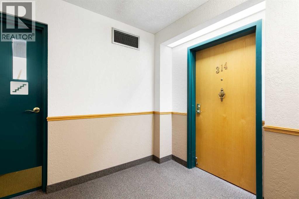 314, 7239 Sierra Morena Boulevard SW, Calgary, Alberta  T3H 3L7 - Photo 4 - A2299016