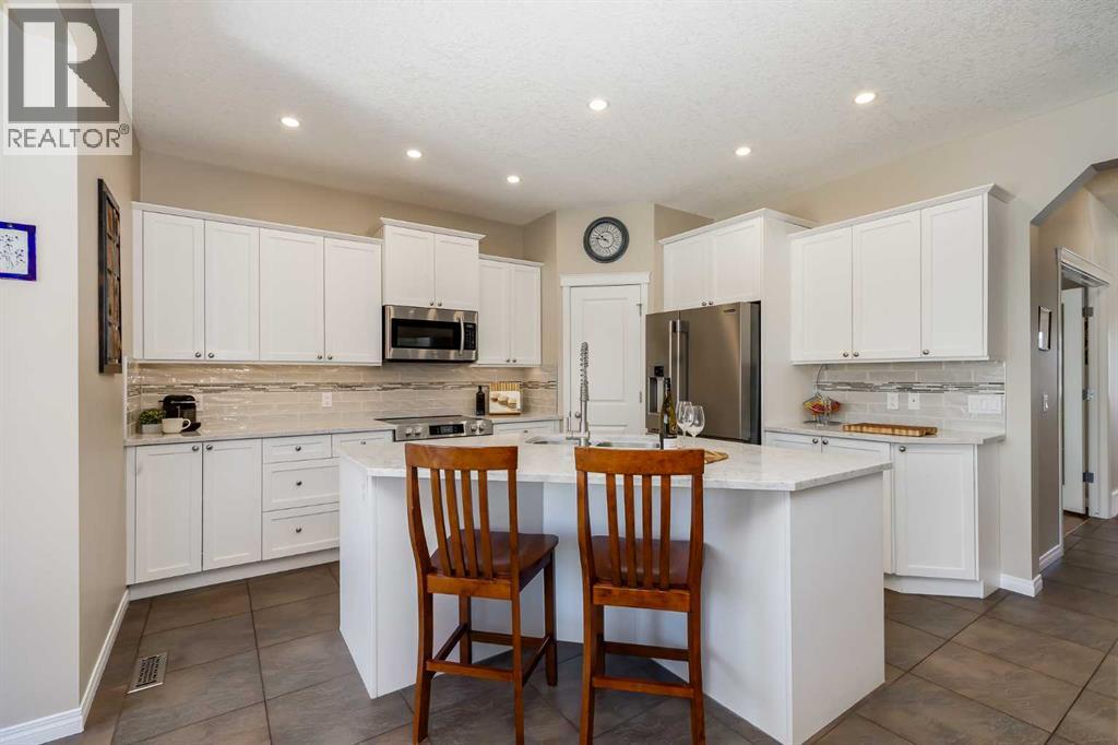 78 Evercreek Bluffs Road SW, Calgary, Alberta  T2Y 4P2 - Photo 8 - A2291591