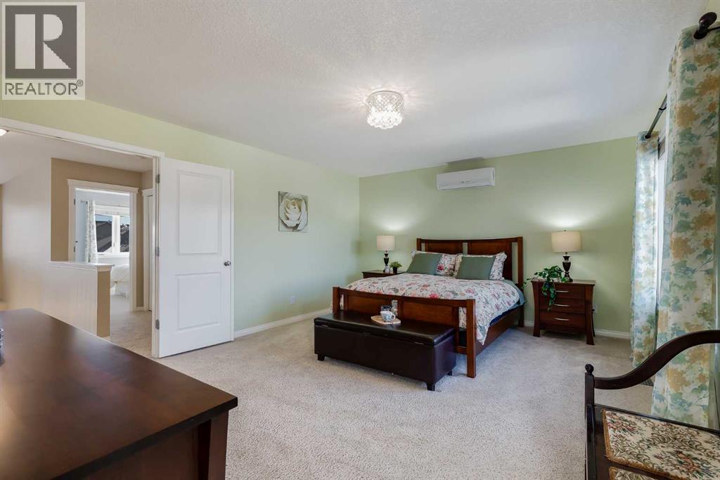 78 Evercreek Bluffs Road SW, Calgary, Alberta  T2Y 4P2 - Photo 24 - A2291591