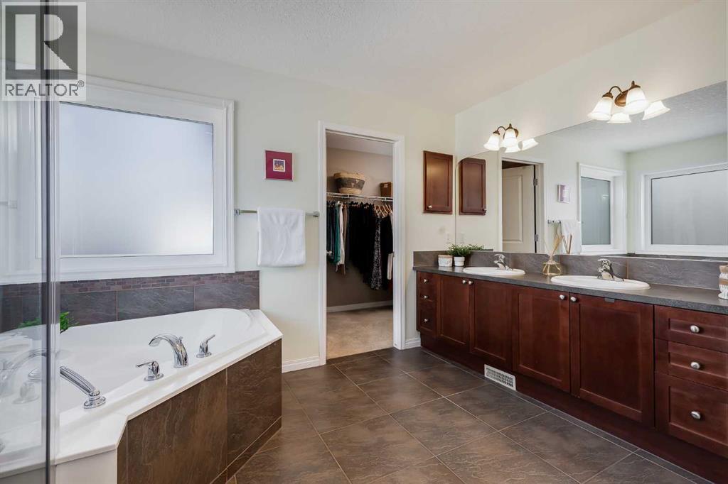 78 Evercreek Bluffs Road SW, Calgary, Alberta  T2Y 4P2 - Photo 26 - A2291591