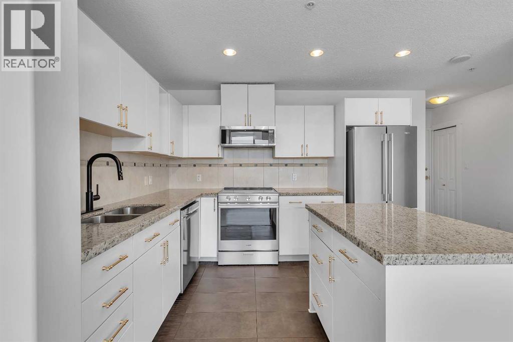 2004, 77 Spruce Place Sw, Calgary, Alberta  T3C 3X6 - Photo 11 - A2286192