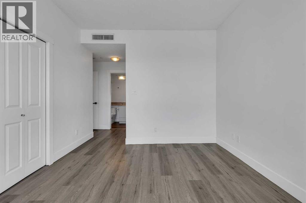 2004, 77 Spruce Place Sw, Calgary, Alberta  T3C 3X6 - Photo 30 - A2286192