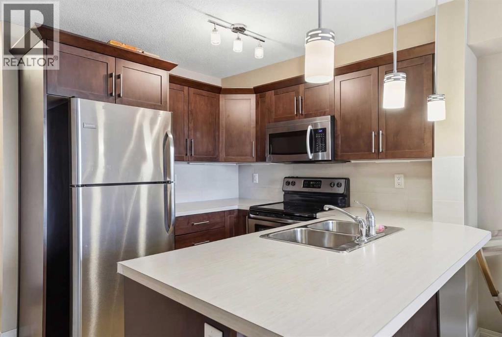 2114, 130 Panatella Street Nw, Calgary, Alberta  T3K 0Y6 - Photo 4 - A2291776