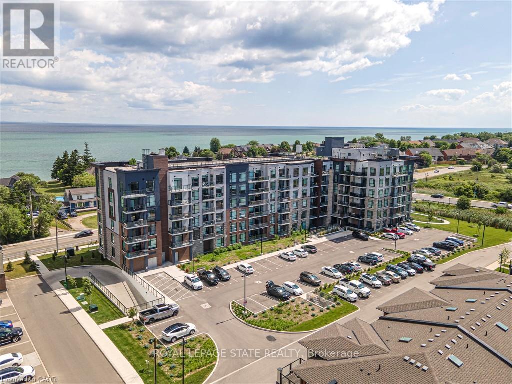 418 - 600 North Service Road, Hamilton, Ontario  L8E 0L2 - Photo 2 - X12980452