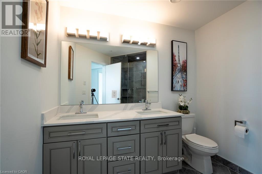 418 - 600 North Service Road, Hamilton, Ontario  L8E 0L2 - Photo 21 - X12980452