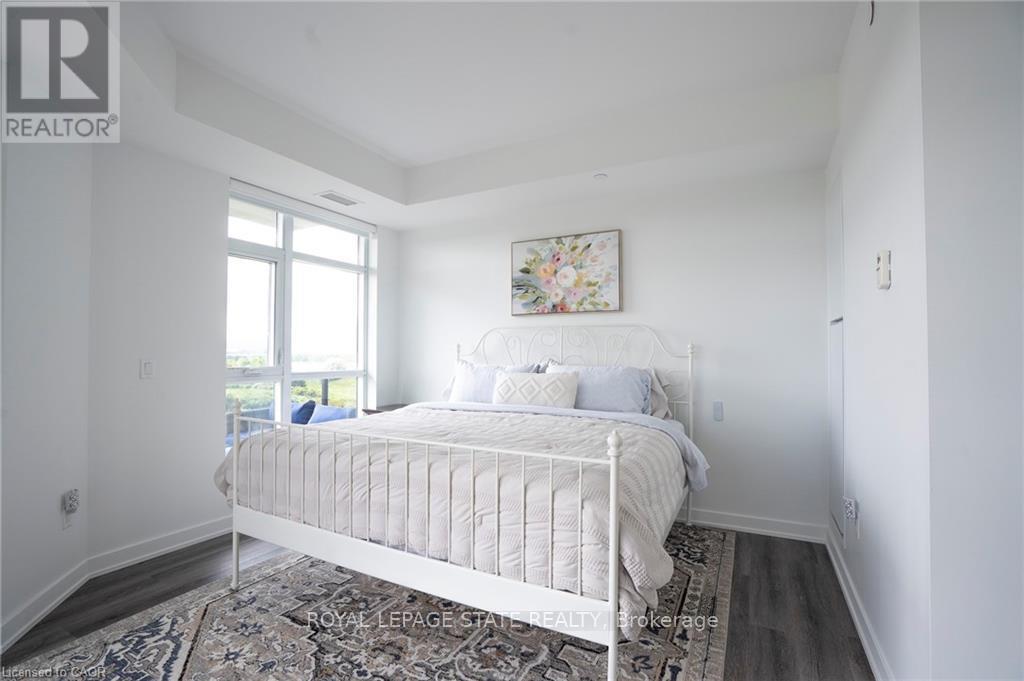 418 - 600 North Service Road, Hamilton, Ontario  L8E 0L2 - Photo 23 - X12980452