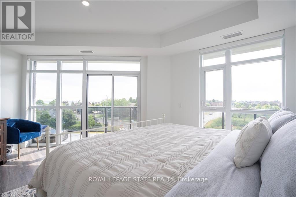 418 - 600 North Service Road, Hamilton, Ontario  L8E 0L2 - Photo 24 - X12980452