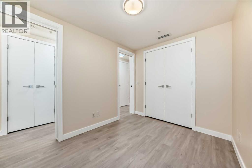 110, 51 Waterfront Mews SW, Calgary, Alberta  T2P 0X3 - Photo 23 - A2300672
