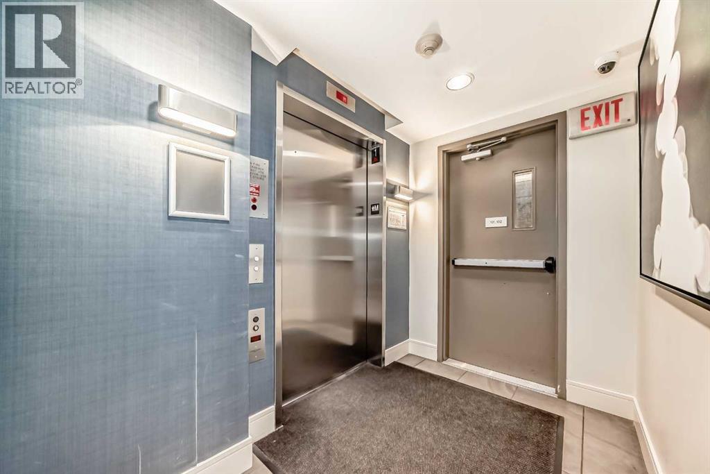 110, 51 Waterfront Mews SW, Calgary, Alberta  T2P 0X3 - Photo 31 - A2300672