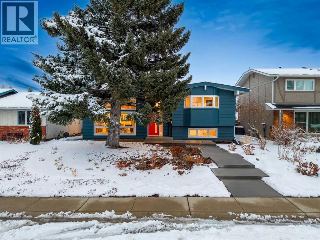 16 Lake Twintree Place Se, Calgary, Alberta  T2J 2X5 - Photo 4 - A2299355