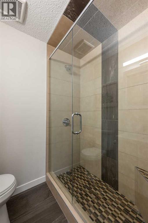 16 Lake Twintree Place Se, Calgary, Alberta  T2J 2X5 - Photo 23 - A2299355