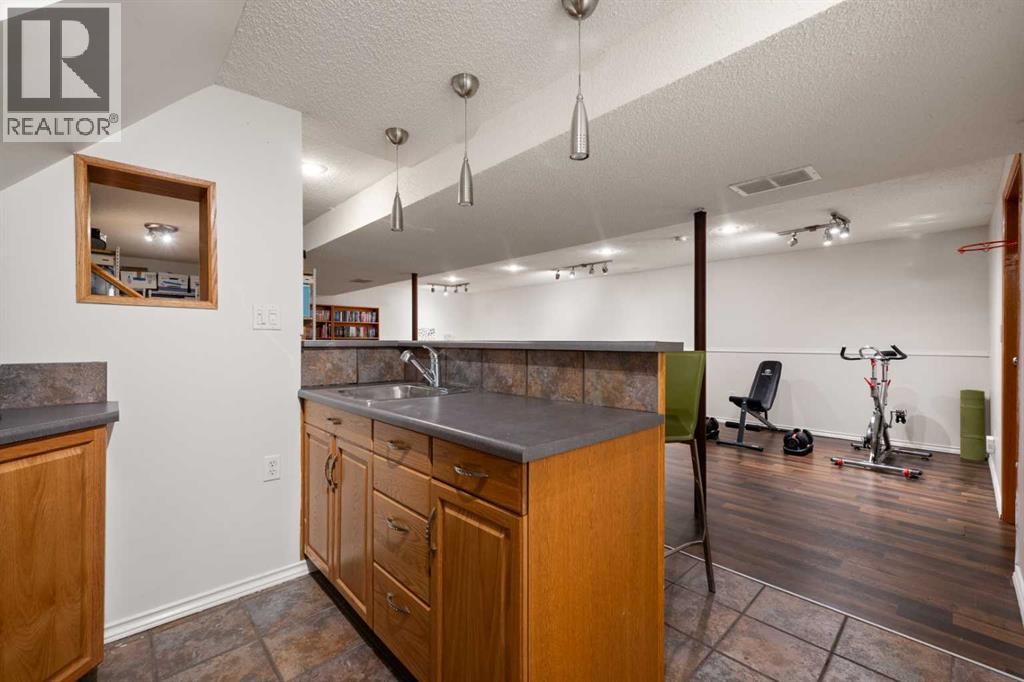 16 Lake Twintree Place Se, Calgary, Alberta  T2J 2X5 - Photo 41 - A2299355