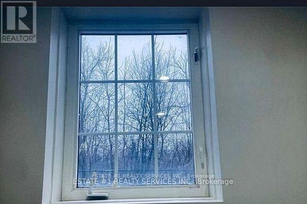 32 River Rock Court, Brampton, Ontario  L7A 2N9 - Photo 6 - W12980794