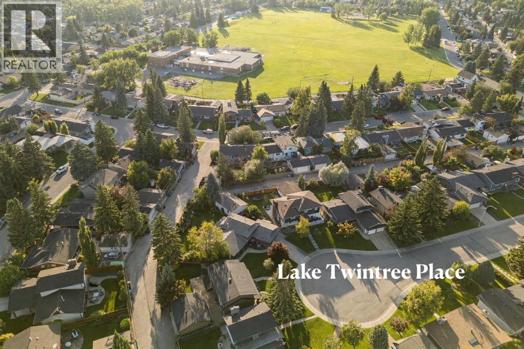 16 Lake Twintree Place Se, Calgary, Alberta  T2J 2X5 - Photo 3 - A2299355