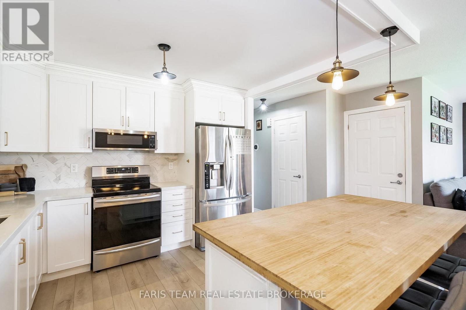 70 Cassandra Drive, Barrie, Ontario  L4M 6Y8 - Photo 7 - S12981020