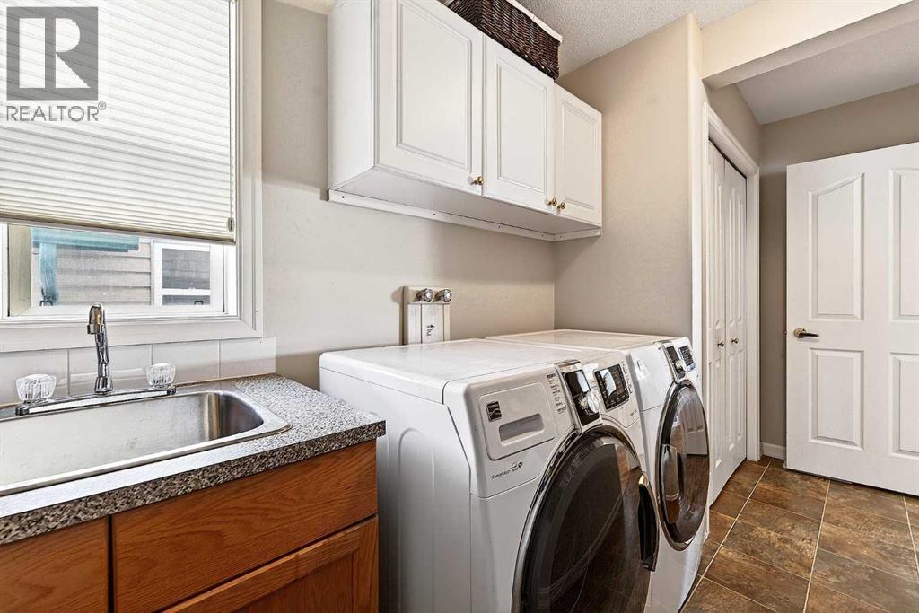 219 Hidden Ranch Circle NW, Calgary, Alberta  T3A 5R1 - Photo 30 - A2299598