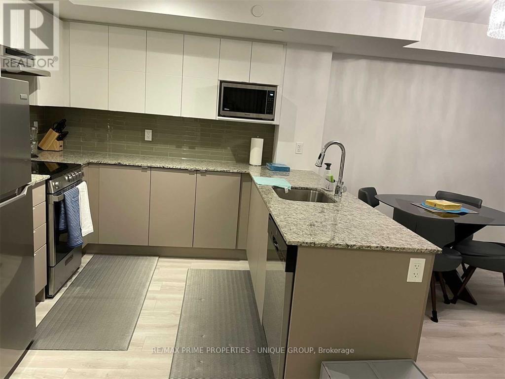 Th 109 - 106 Varna Drive, Toronto, Ontario  M6H 0C8 - Photo 12 - W12981096