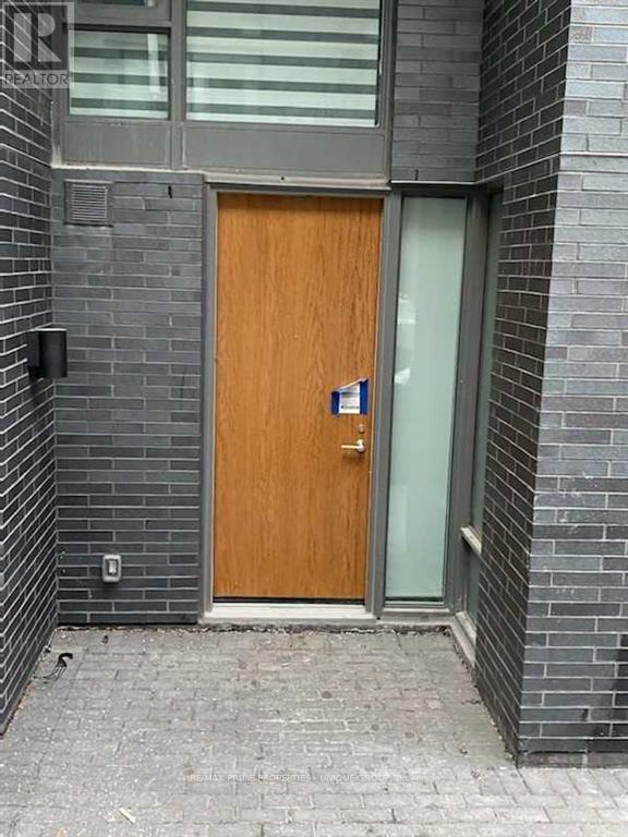 Th 109 - 106 Varna Drive, Toronto, Ontario  M6H 0C8 - Photo 2 - W12981096