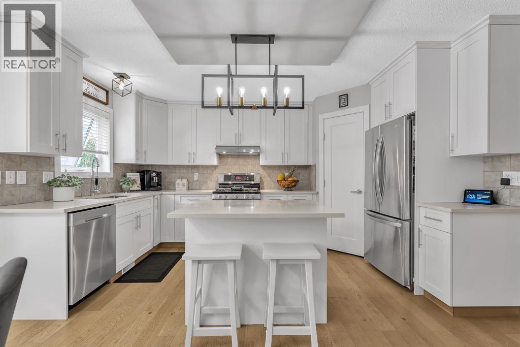 419 Rocky Ridge Bay NW, Calgary, Alberta  t3g 4h8 - Photo 9 - A2299448