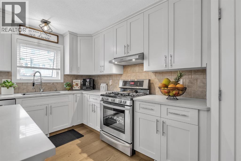 419 Rocky Ridge Bay NW, Calgary, Alberta  t3g 4h8 - Photo 10 - A2299448