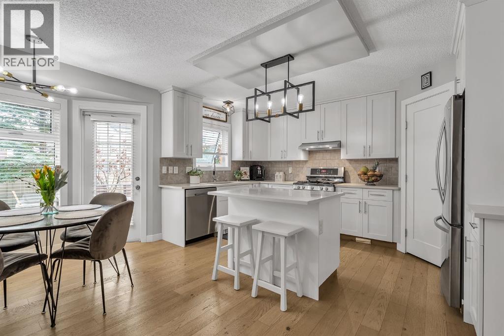 419 Rocky Ridge Bay NW, Calgary, Alberta  t3g 4h8 - Photo 8 - A2299448