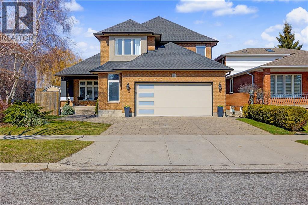 The perfect family home in the sought-after Stoney Creek Mountain, Leckie Park neighbourhood. Brimming with curb appeal, this 3-bedroom, 3.5 bathroom home offers over 3100 sq ft of finished living space. Tastefully decorated and thoughtfully updated, there’s nothing to do but move in. Soaring vaulted ceilings in the formal living and dining area create a bright and open feel. The family room features a cozy gas fireplace, built-in storage, and opens into the beautifully updated custom kitchen, complete with granite counters, a centre island with seating, and high-end appliances. Upstairs, you’ll find three well-sized bedrooms, including a spacious primary suite with a walk-in closet and a 5-piece, spa-like ensuite featuring double sinks, a glass shower, and a freestanding soaker tub. The fully finished basement offers plenty of storage, flexible living space, and a 3-piece bathroom. Step outside to your own private backyard retreat, complete with a heated inground pool, stone patio, and cabana shed—ideal for relaxing or entertaining. The 2.5 car garage is insulated and equipped with a split unit for heating and A/C (2021). Additional features include hardwood flooring throughout the main and upper levels, pot lights, California shutters, main floor laundry, and updated bathrooms. Recent updates include the roof shingles (2022), eavestroughs and downspouts (2023), and pool liner and heater (2023). Conveniently located close to schools, parks, playgrounds, shopping, entertainment, transit, highway access, and scenic nature trails. (id:48254)