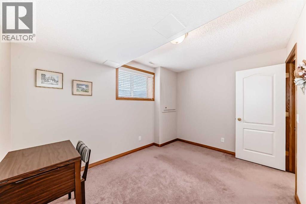 220 Rocky Ridge Villas NW, Calgary, Alberta  T3G 4R3 - Photo 36 - A2297086