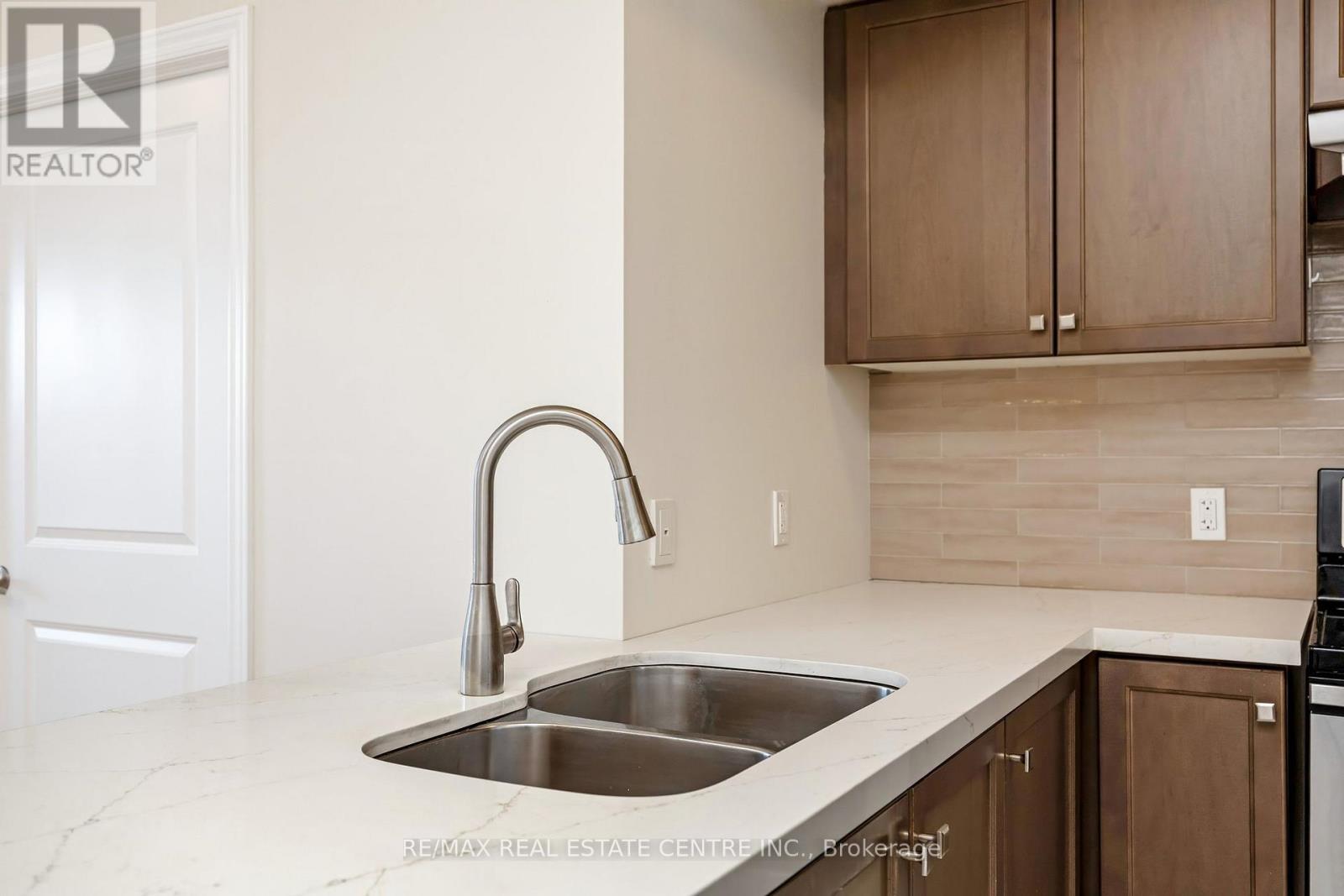 408 - 650 Sauve Street, Milton, Ontario  L9T 9A8 - Photo 10 - W12981684